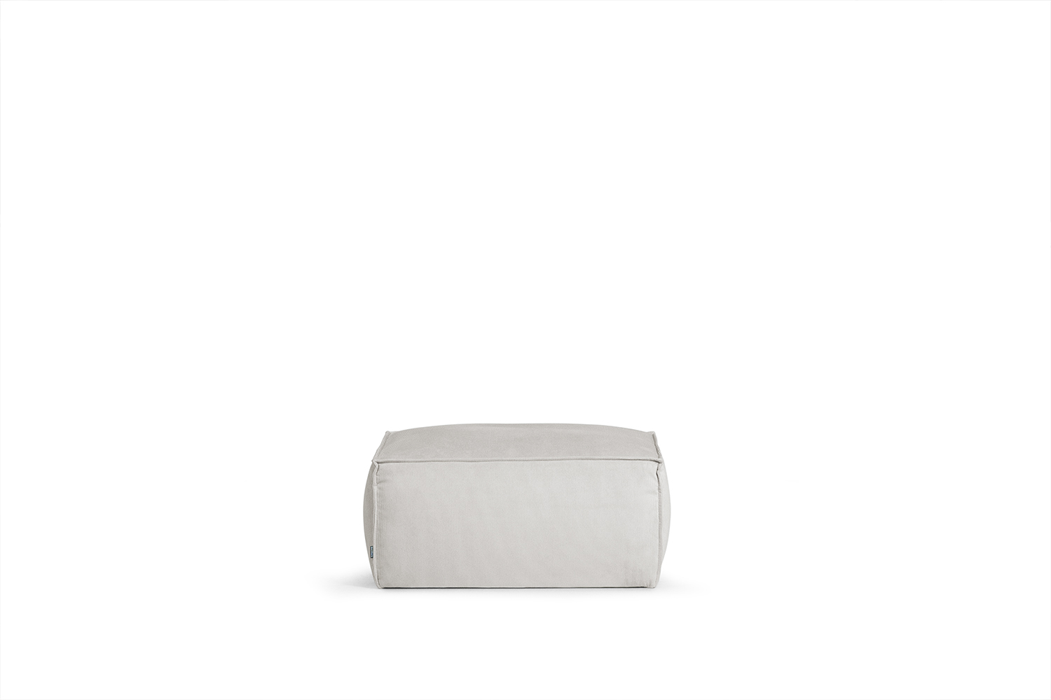 In picture: Robust footstool. Fabric: Wave 50.