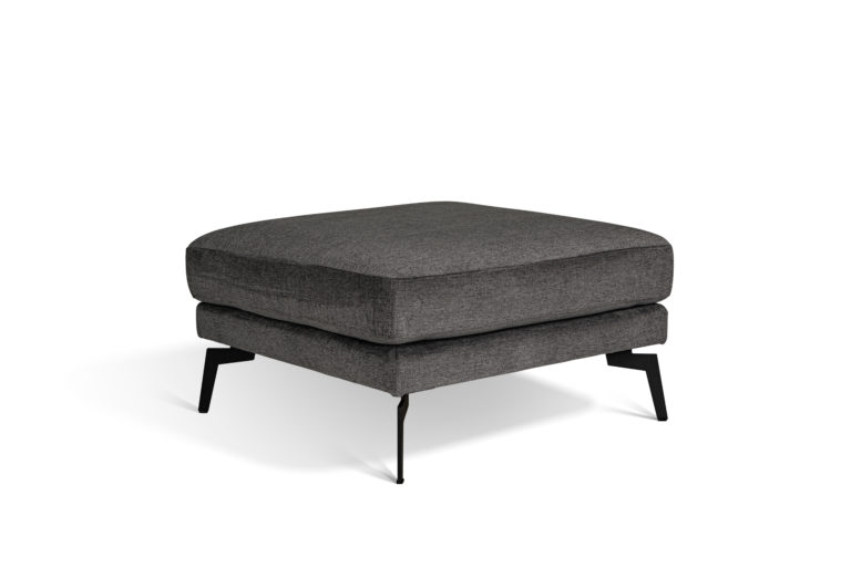 In picture: Coral Magnum footstool. Fabric: Tarim18. Leg: 122, matte black.