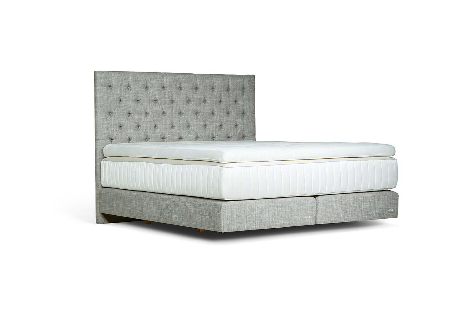 In picture: Nordic C40 with Windsor headboard and Sirius top mattress. Fabric: Lineo 616.