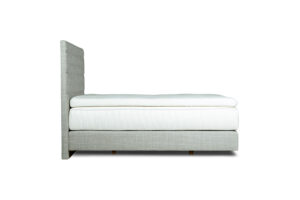 In picture: Nordic C40 with Windsor headboard and Sirius top mattress. Fabric: Lineo 616.