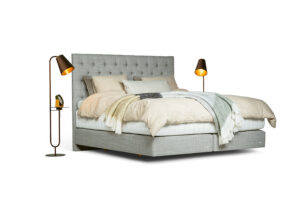 In picture: Nordic C40 with Windsor headboard and Sirius top mattress. Fabric: Lineo 616.